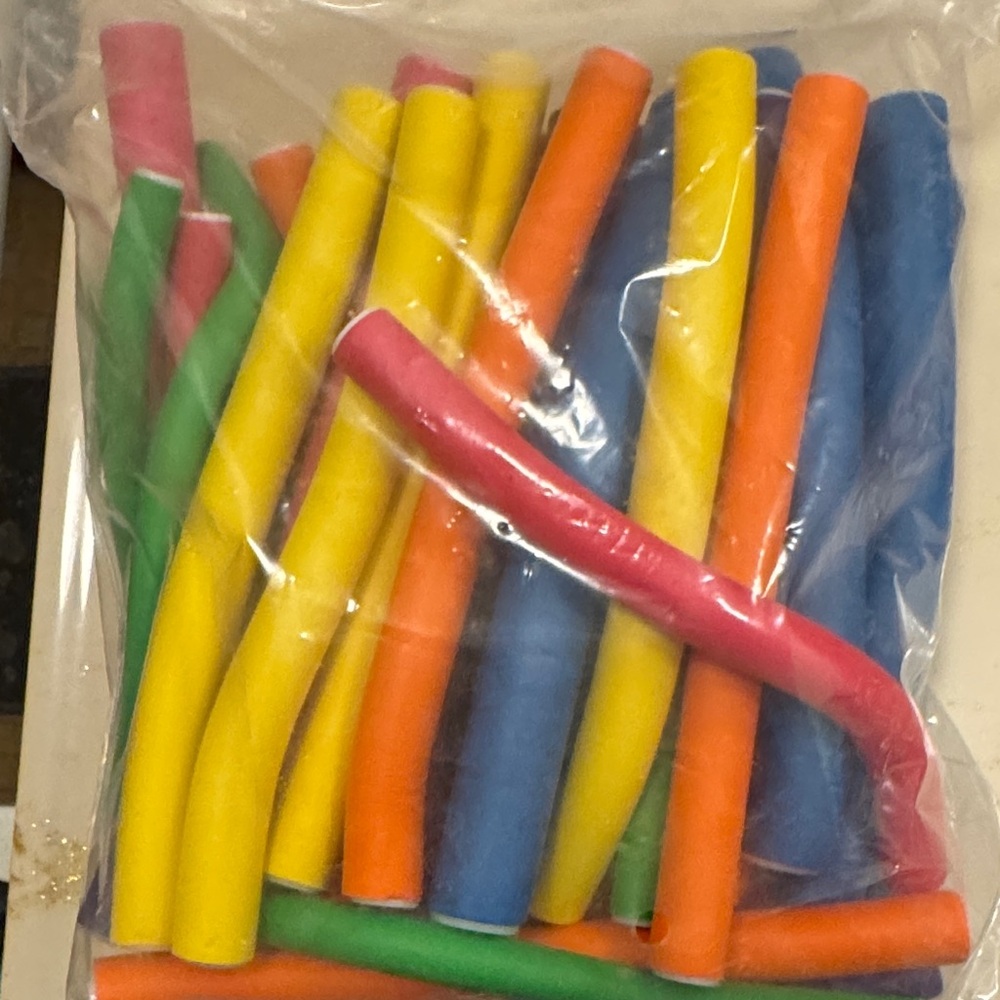 Self grip hair roller set